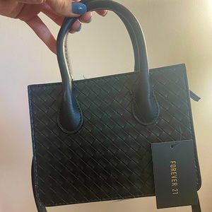 Black crossbody woven handbag